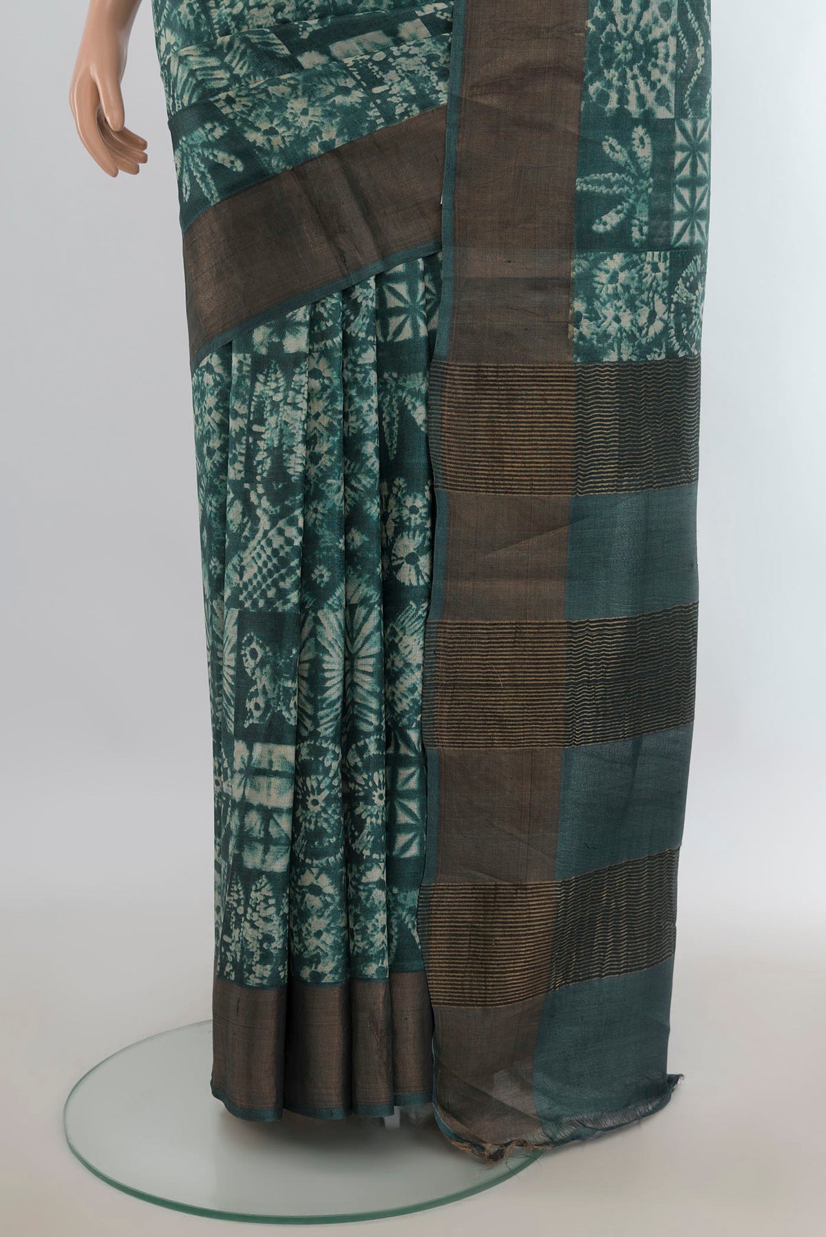Pleats and pallu of Multi Color Tussar Saree with Floral Print on the body and Silk Border. 