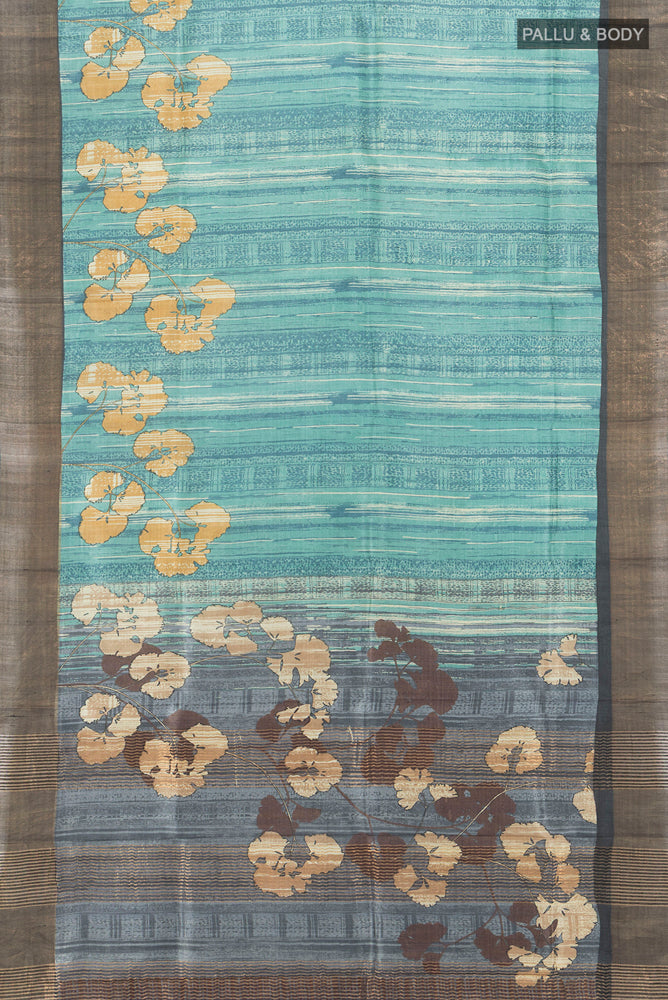 Flat view of Pure Silk Pure Zari Multi Color Tussar Saree with Floral Print on the body and Silk Border. 