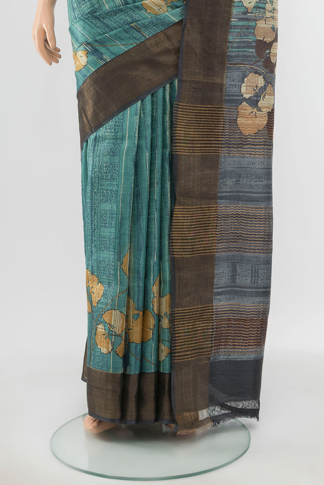 Pleats and pallu of Pure Silk Pure Zari Multi Color Tussar Saree with Floral Print on the body and Silk Border. 