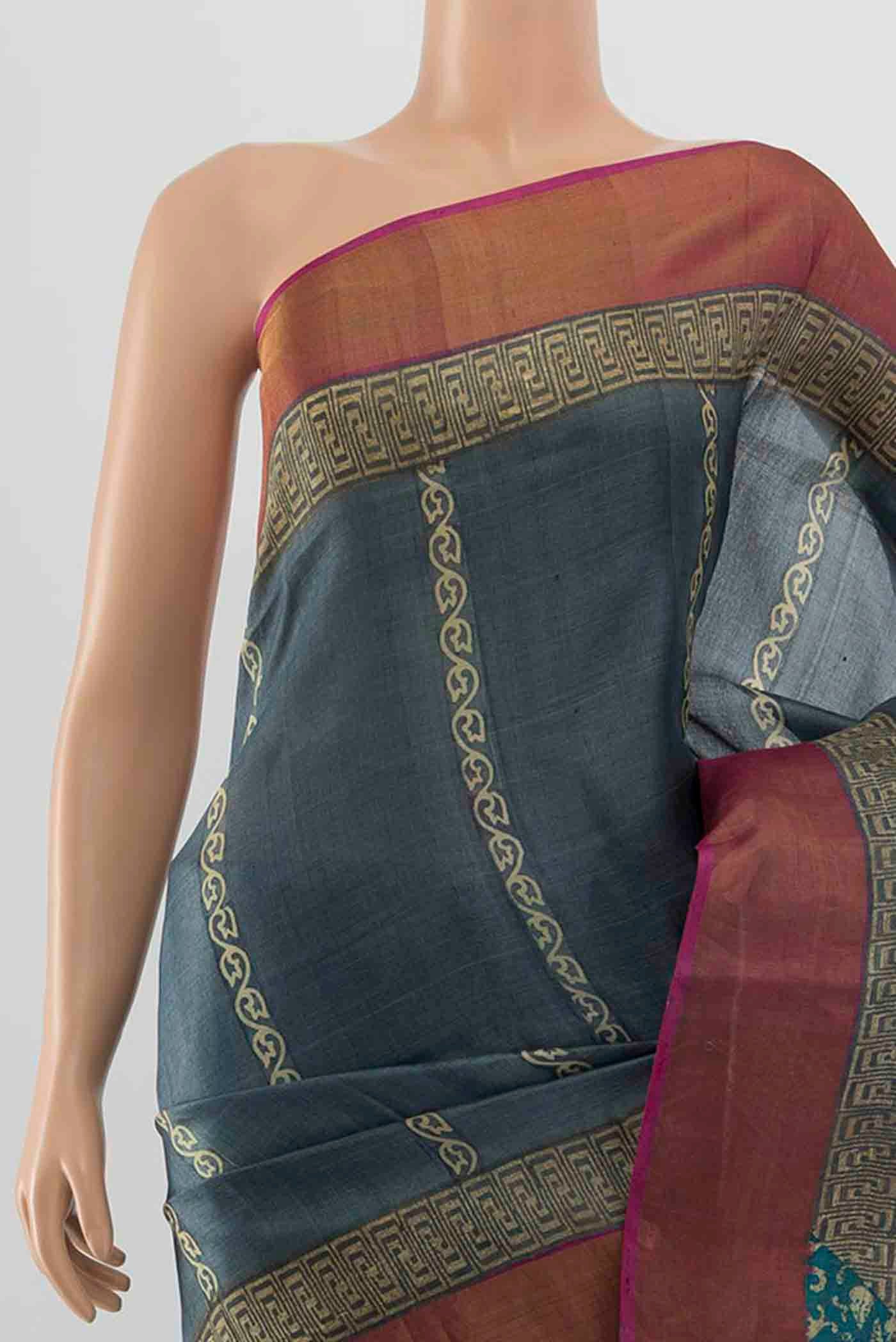 Border image of Grey Tussar Silk Saree with Floral Print on the body and Silk Border