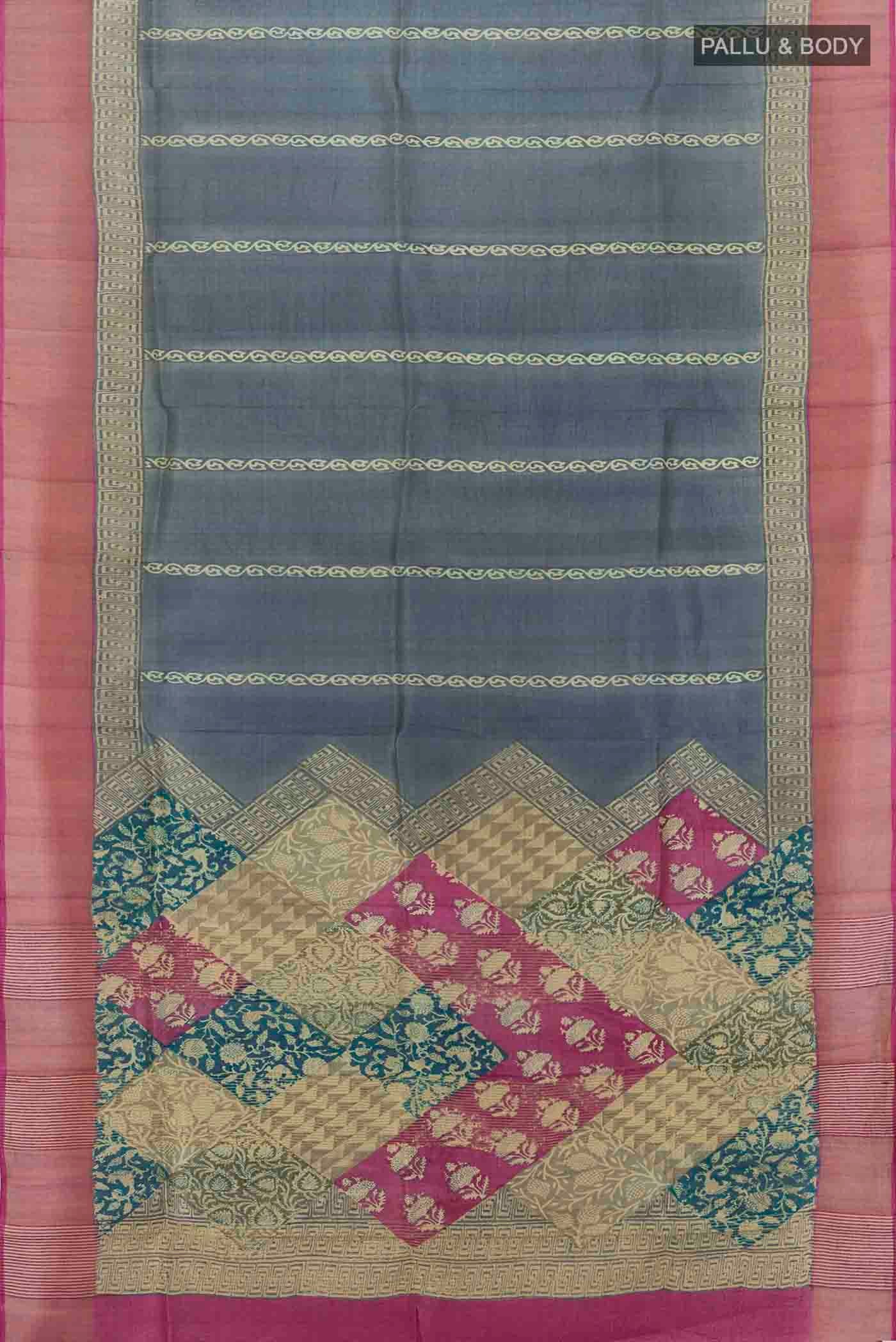 Flat view of Grey Tussar Silk Saree with Floral Print on the body and Silk Border