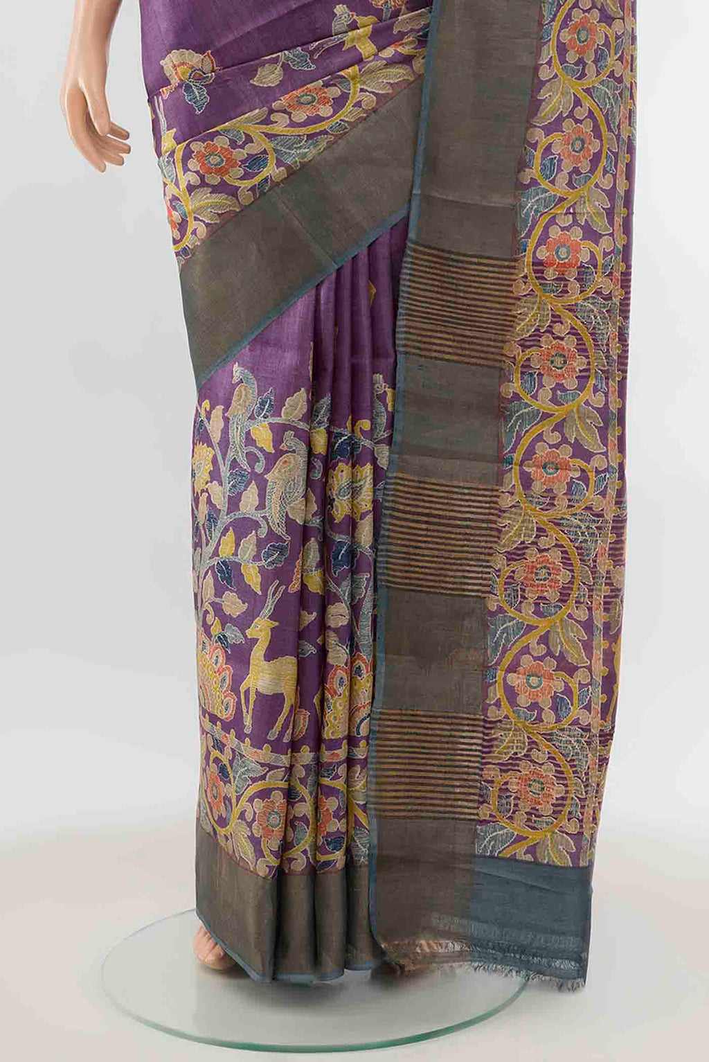 Pleats and pallu of Violet Tussar Silk Saree with Zari Butta on the body and Silk Border