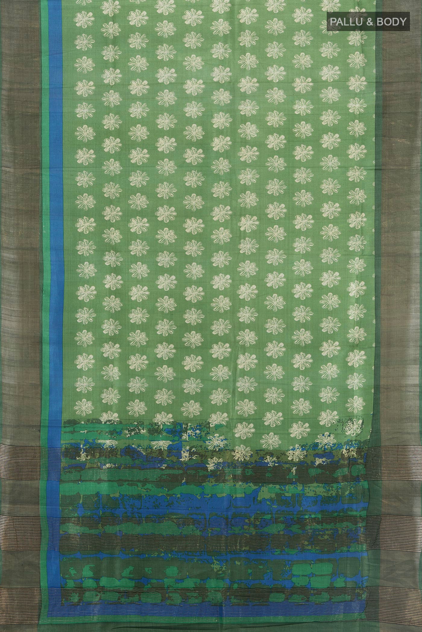 Flat view of Pista Green Tussar Silk Saree with Floral Print on the body and Zari Border. 