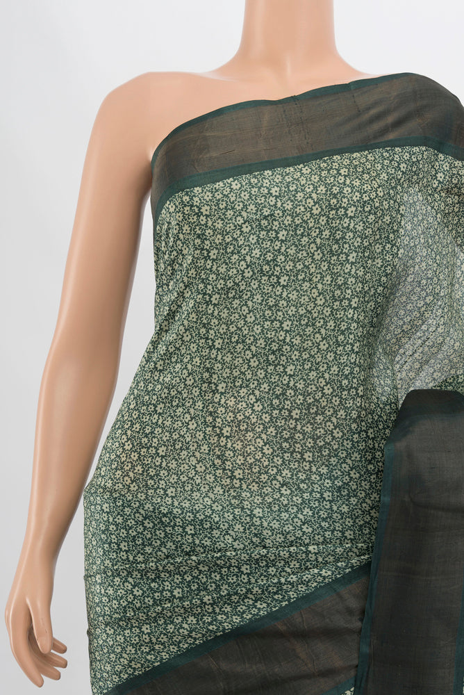 Border image of Light Green Tussar Silk Saree with Zari Butta on the body and Silk Border. 
