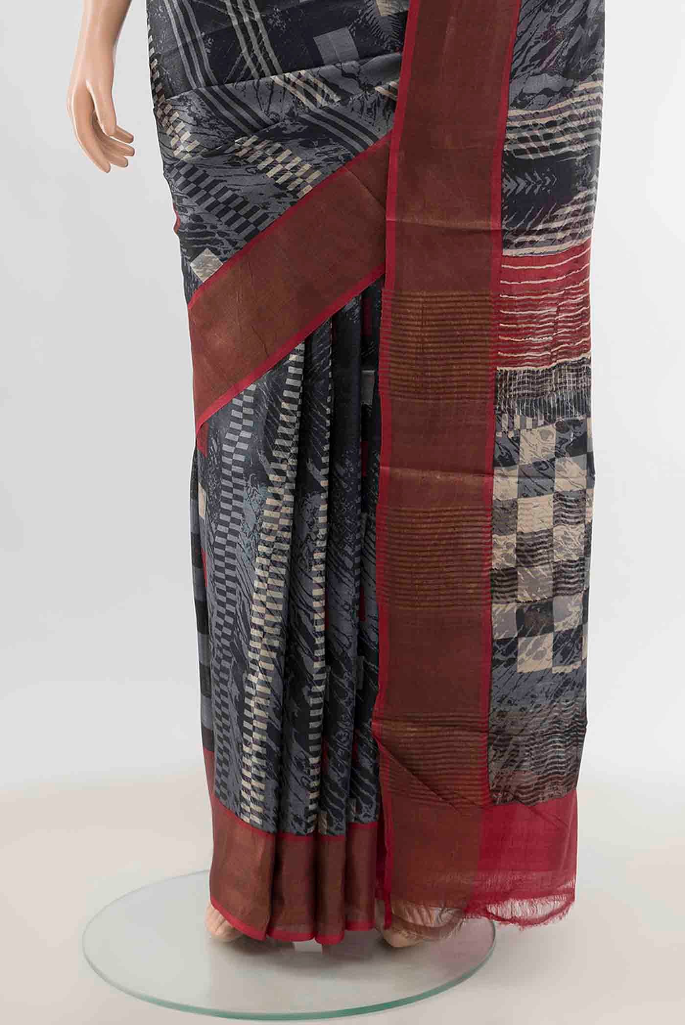 Pleats and pallu of Pure Silk Pure Zari Grey Tussar Saree with Zari Brocade on the body and Silk Border