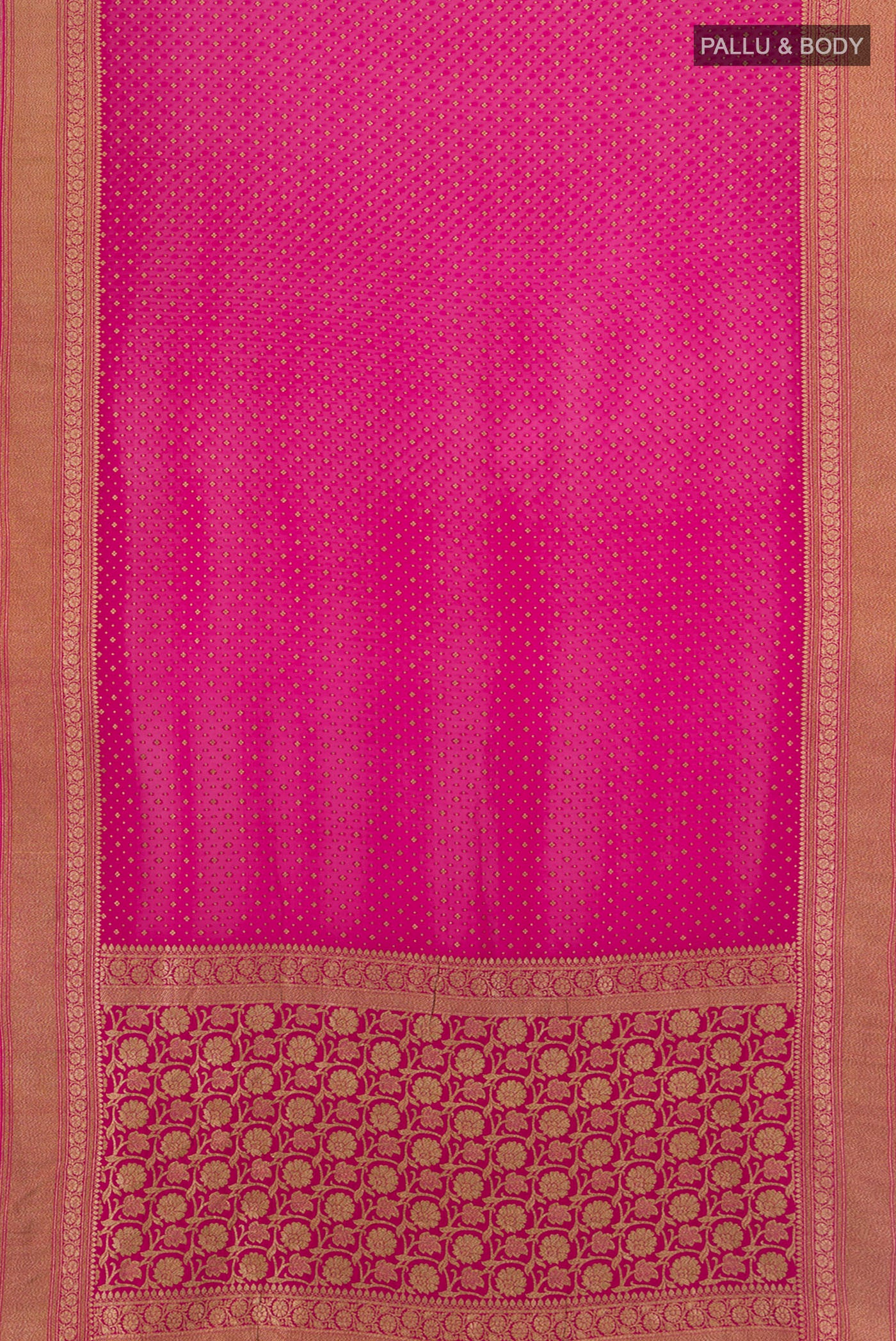 Flat view of Rani Pink Banarasi Georgette Saree with Zari Butta on the body and Silk Border. 