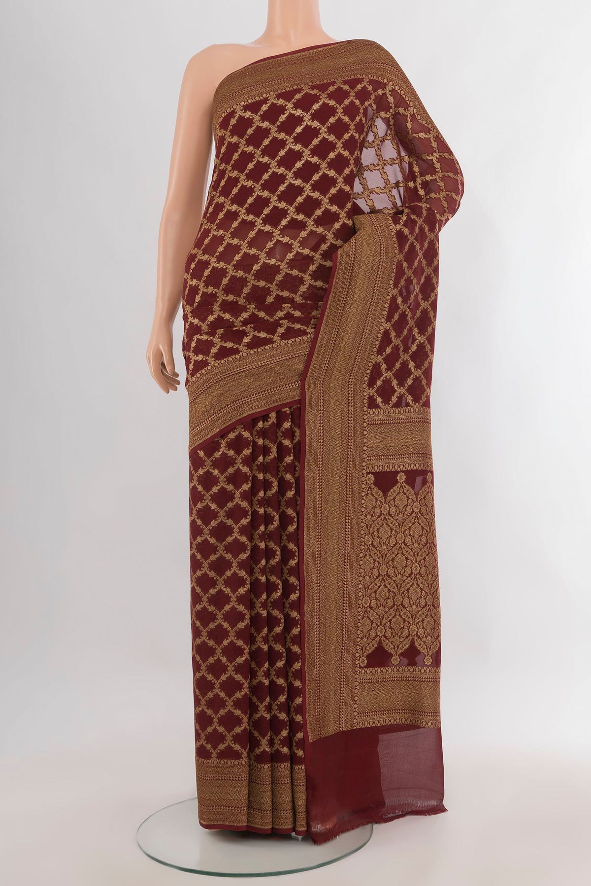 Coffee Brown Banarasi Georgette Saree with Zari Brocade on the body and Zari Border.  displayed on a mannequin