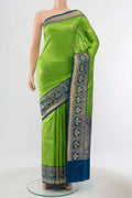 Parrot Green Banarasi Katan Silk Saree with Zari Butta on the body and Silk Border displayed on a mannequin