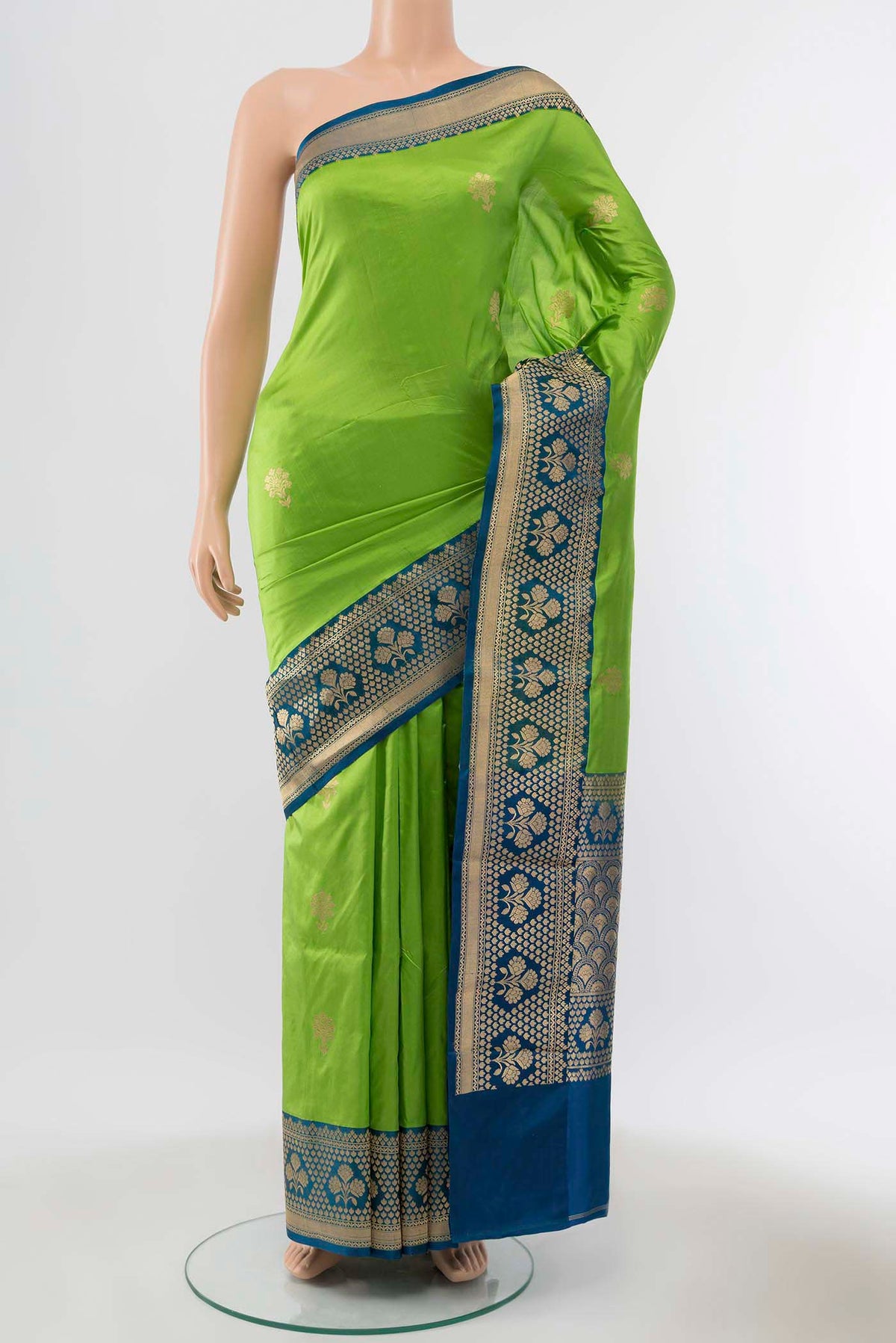 Parrot Green Banarasi Katan Silk Saree with Zari Butta on the body and Silk Border displayed on a mannequin