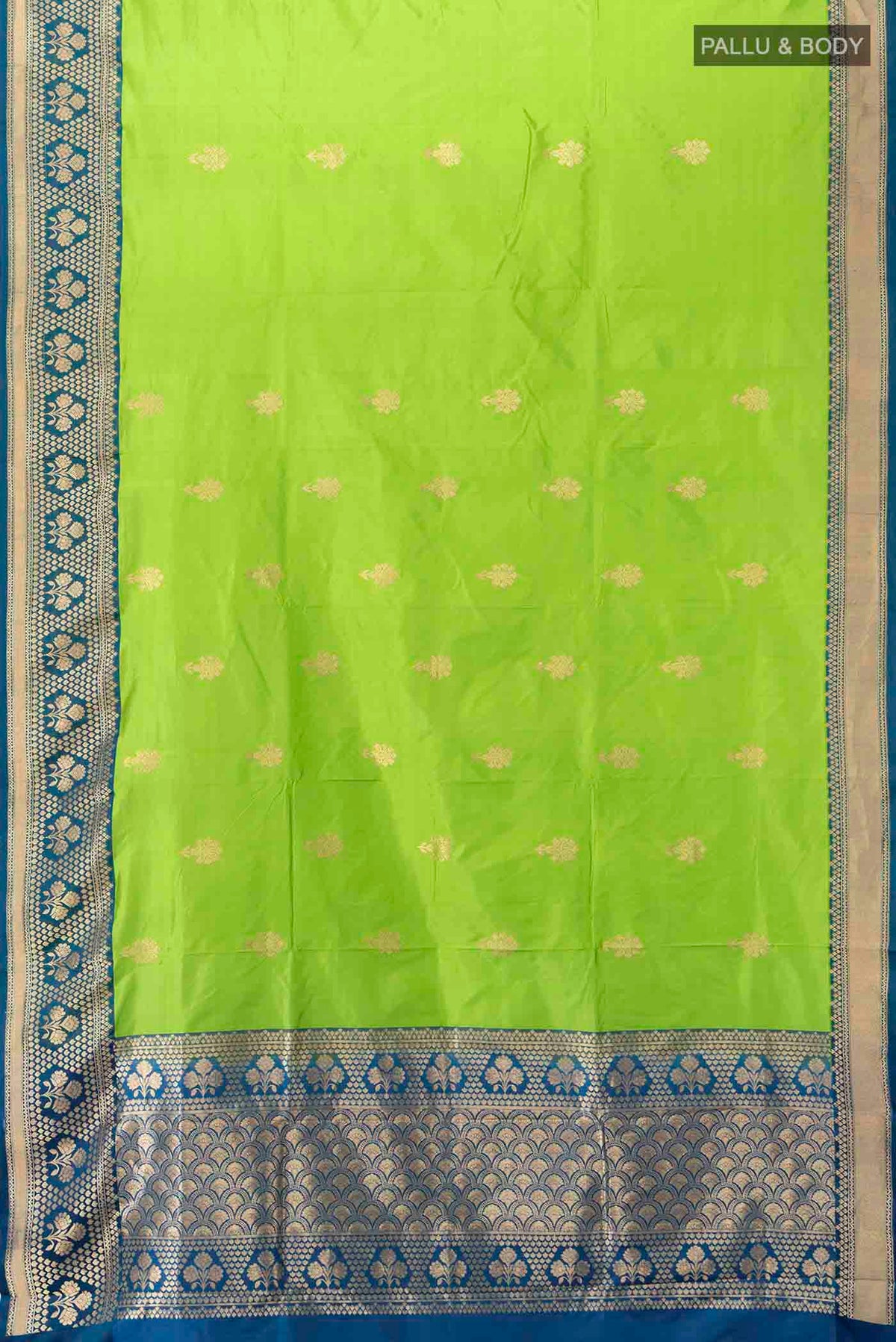 Flat view of Parrot Green Banarasi Katan Silk Saree with Zari Butta on the body and Silk Border