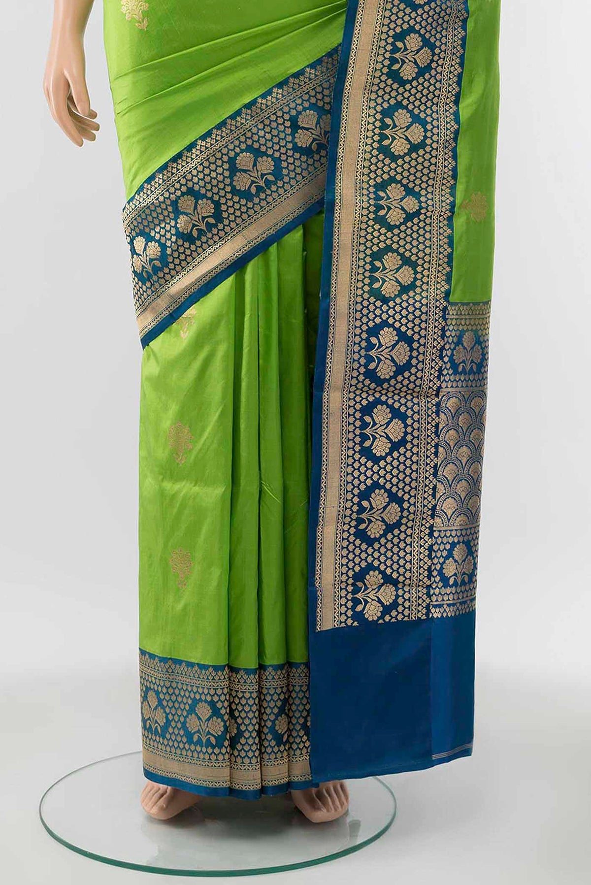 Pleats and pallu of Parrot Green Banarasi Katan Silk Saree with Zari Butta on the body and Silk Border