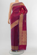 Purple Banarasi Katan Silk Saree with Zari Butta on the body and Silk Border.  displayed on a mannequin