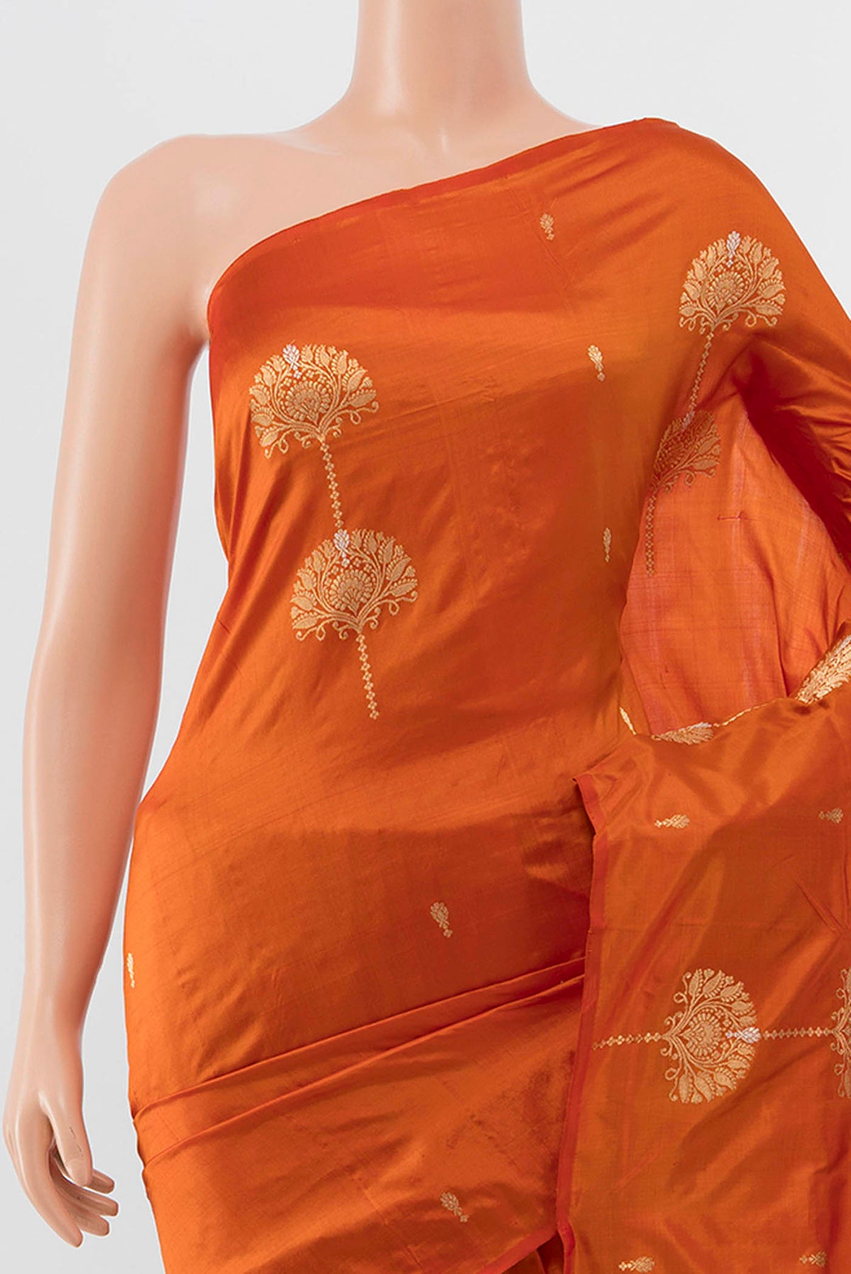 Border image of Orange Banarasi Katan Silk Saree with Zari Butta on the body and Without Border