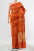 Orange Banarasi Katan Silk Saree with Zari Butta on the body and Without Border displayed on a mannequin