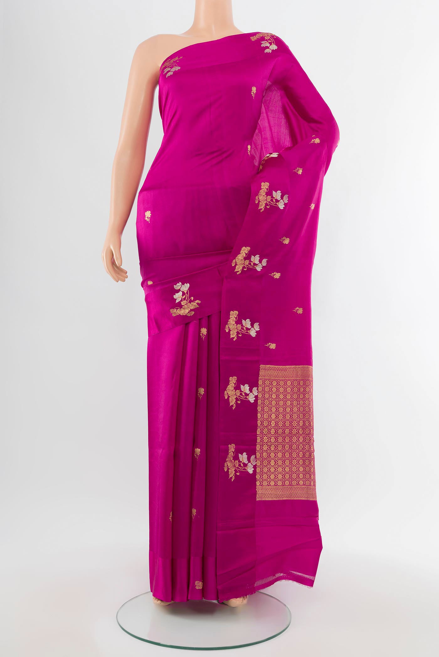 Purple Banarasi Katan Silk Saree with Zari Butta on the body and Silk Border.  displayed on a mannequin