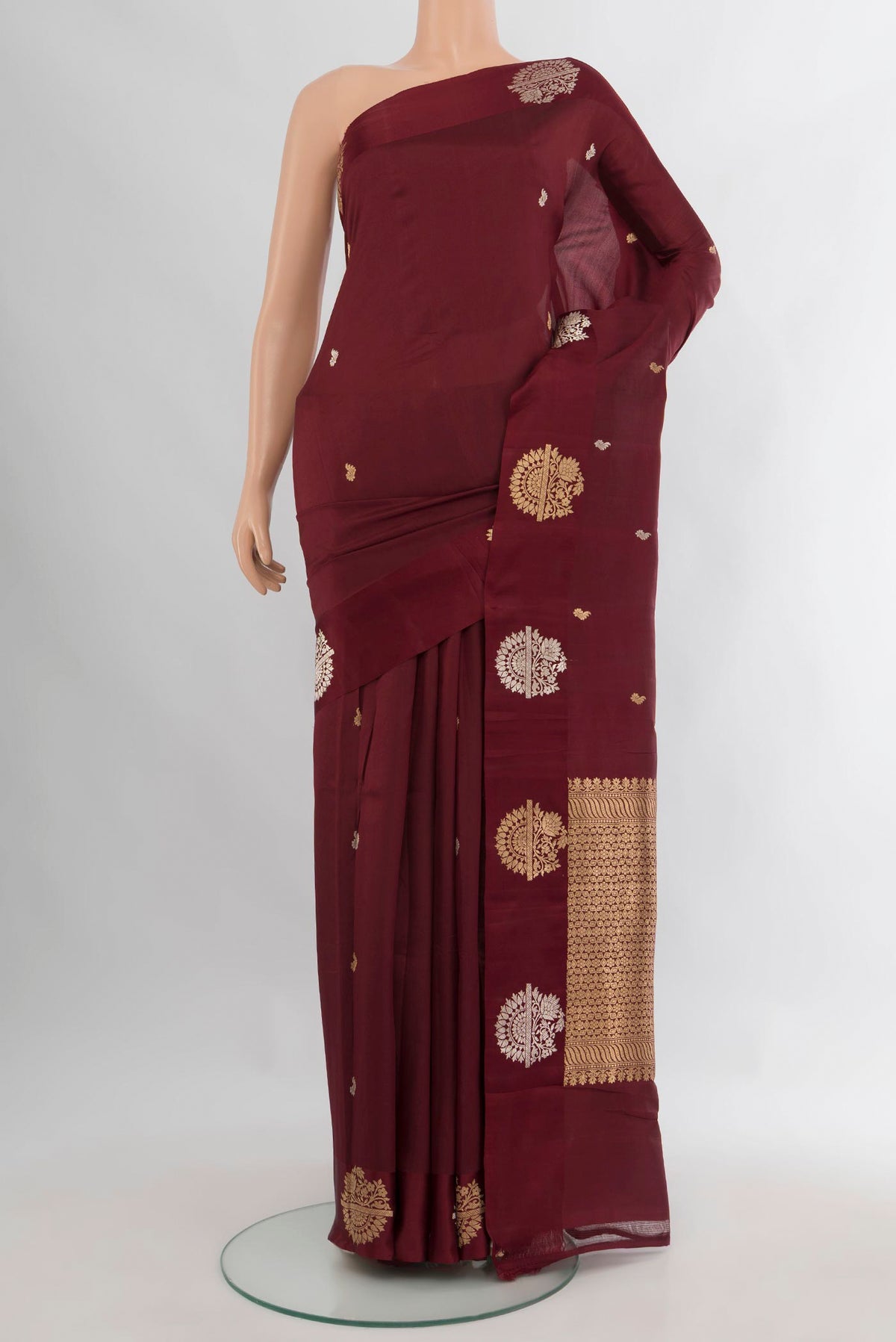 Pure Silk Coffee Brown Banarasi Katan Saree with Zari Butta on the body and Fancy Border.  displayed on a mannequin