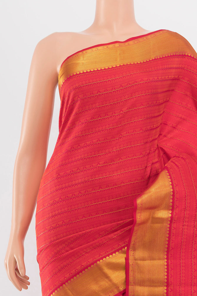 Border image of Peach Kanchipuram Silk Saree with Zari Butta on the body and Silk Border. 