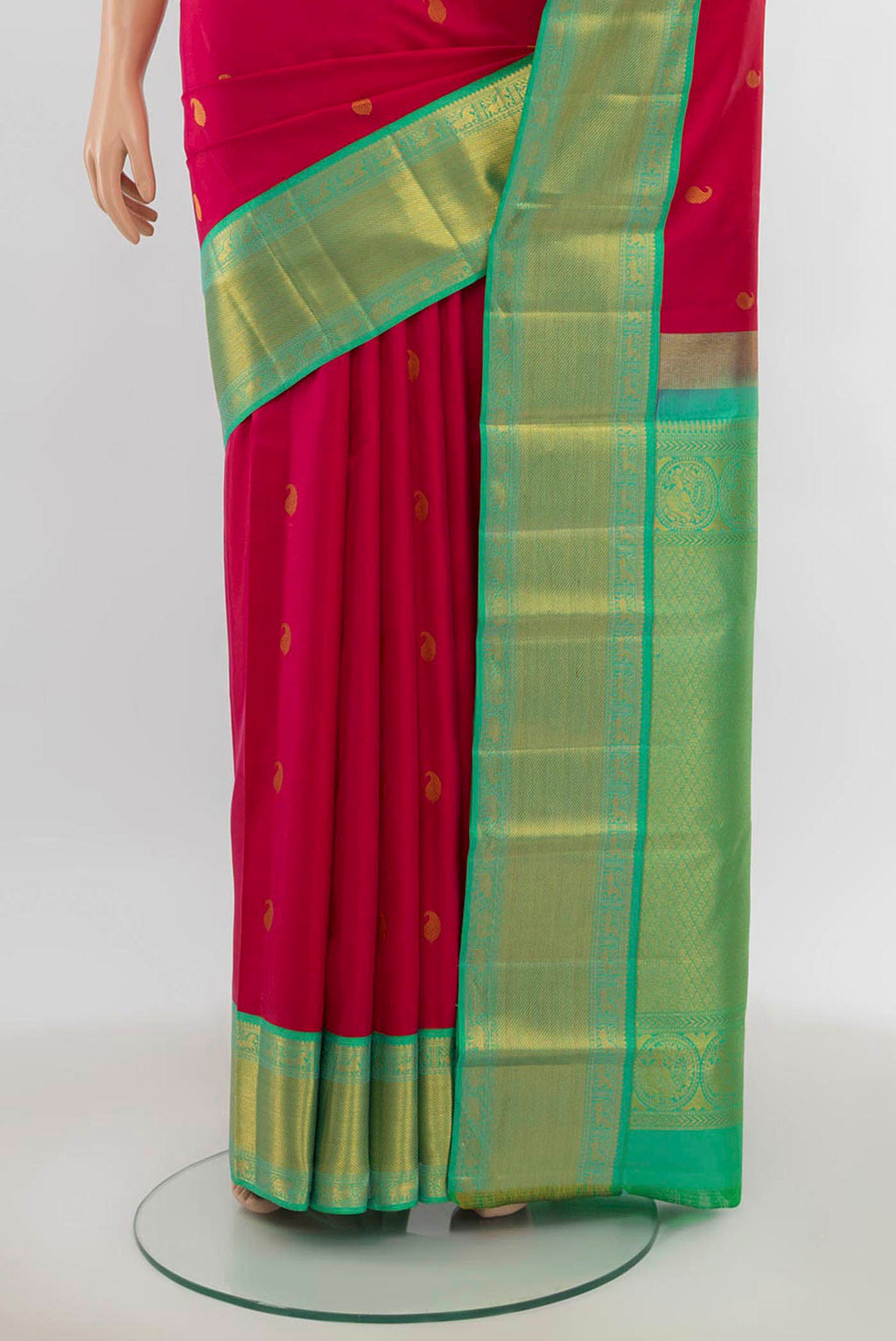 Pleats and pallu of Imperial Pink Kanchipuram Silk Saree with Zari Butta on the body and Silk Border. 