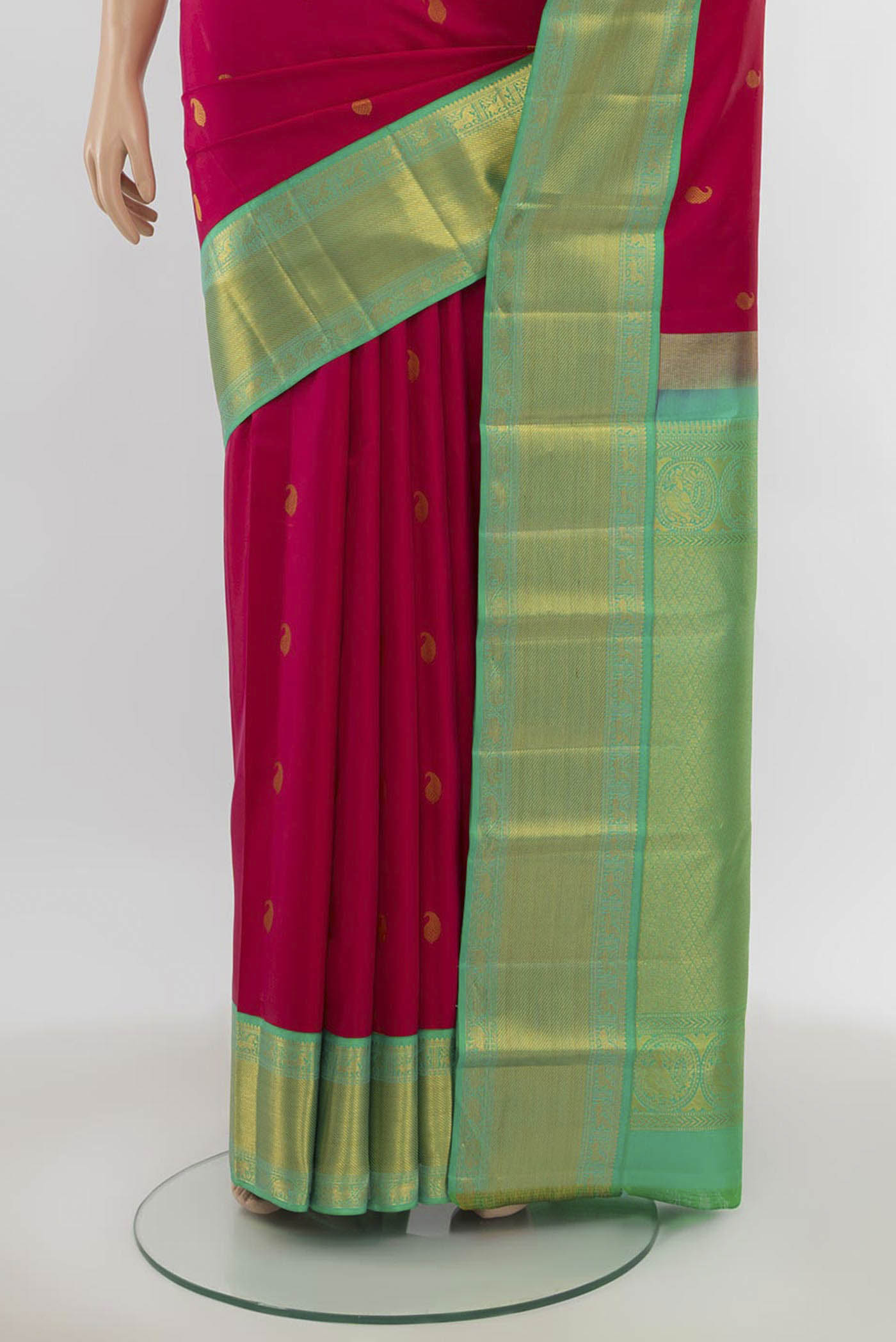 Pleats and pallu of Imperial Pink Kanchipuram Silk Saree with Zari Butta on the body and Silk Border. 