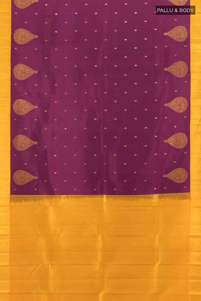 Flat view of Purple Kanchipuram Silk Saree with Zari Butta on the body and Silk Border. 