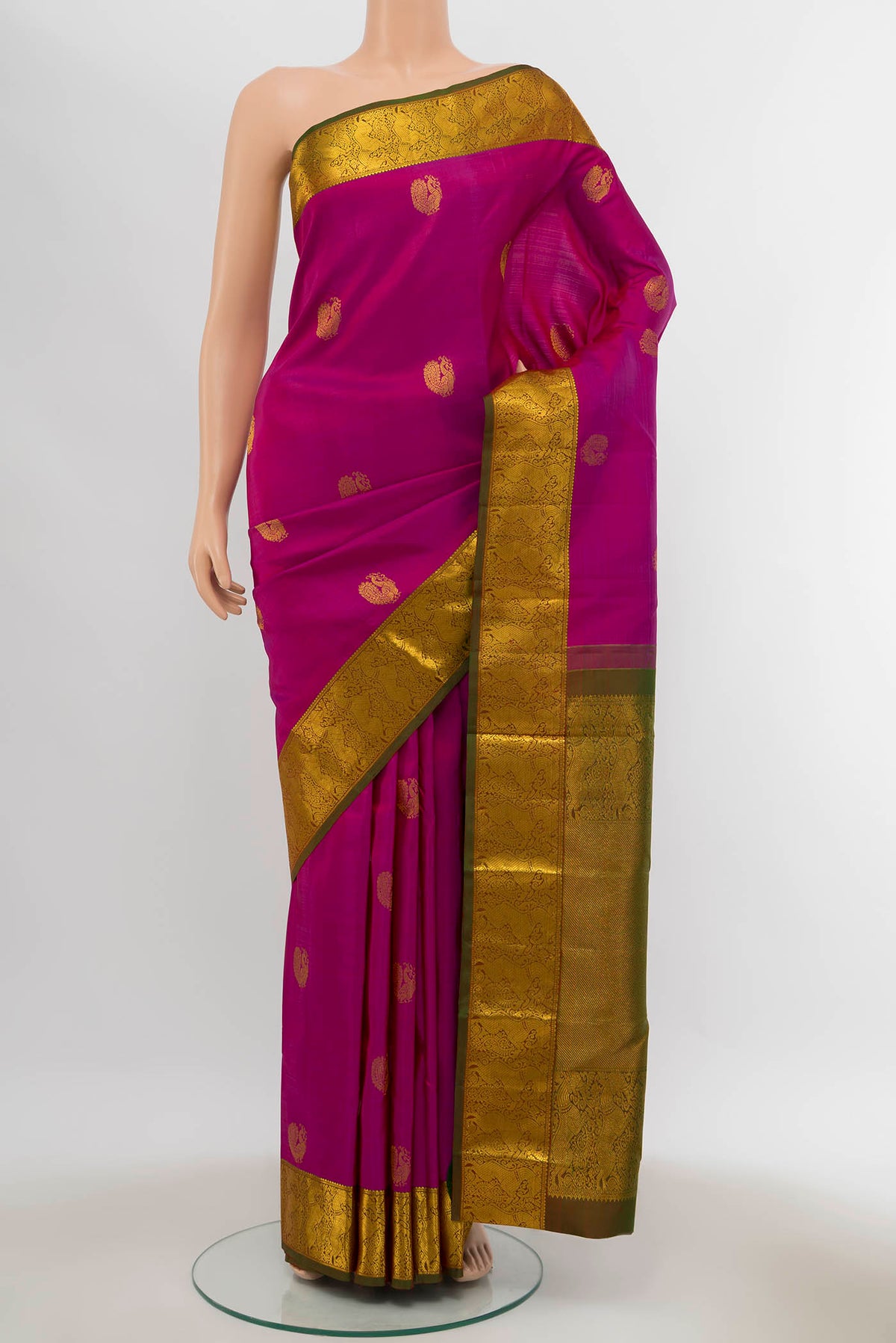 Magenta Kanchipuram Silk Saree with Zari Brocade on the body and Silk Border displayed on a mannequin