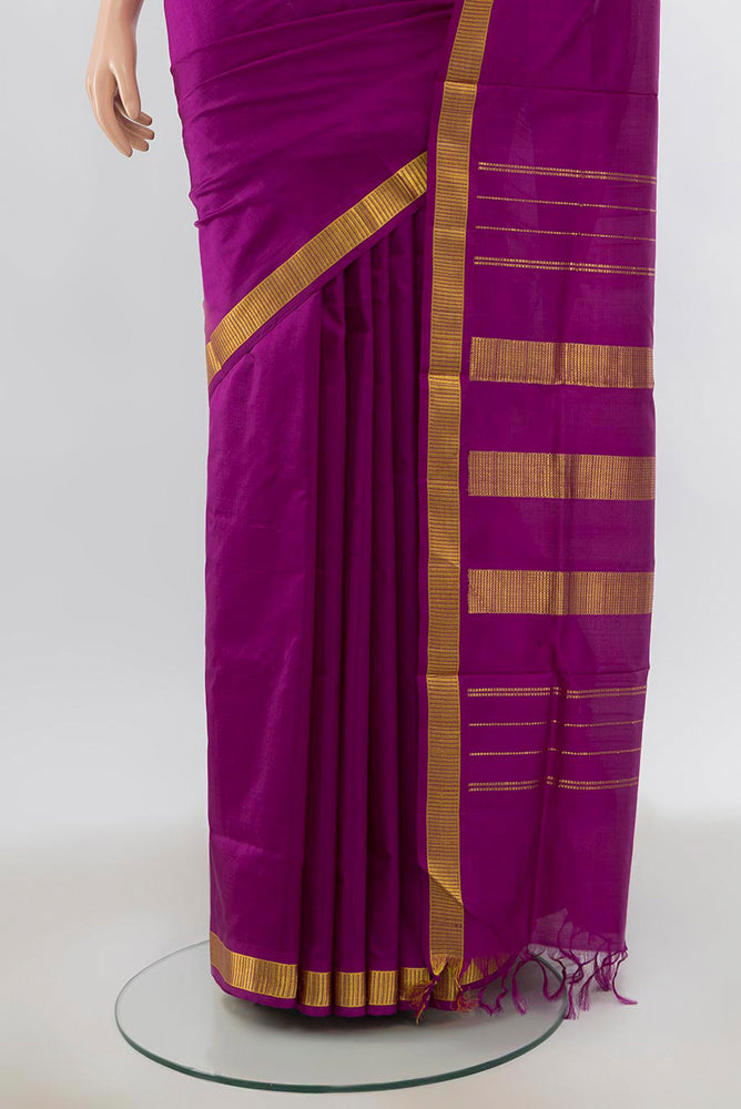 Pleats and pallu of Purple Kanjivaram Silk Nine Yards Saree with Zari Butta on the body and Silk Border. 