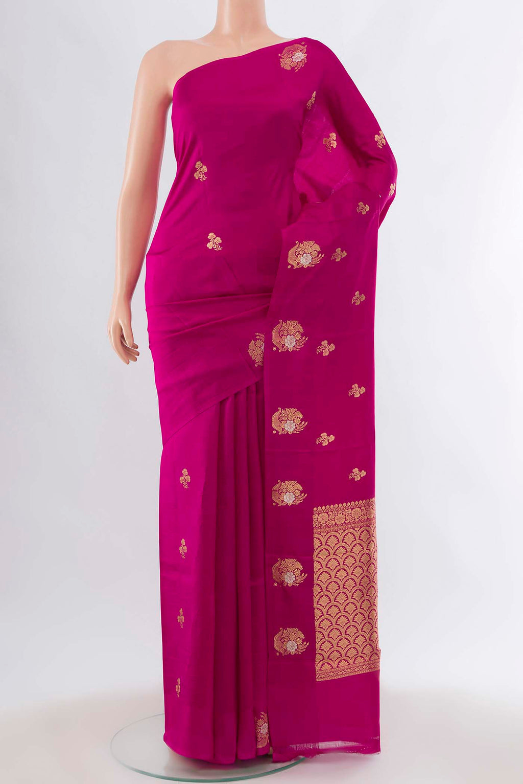 Magenta Banarasi Katan Silk Saree with Zari Butta on the body and Without Border displayed on a mannequin