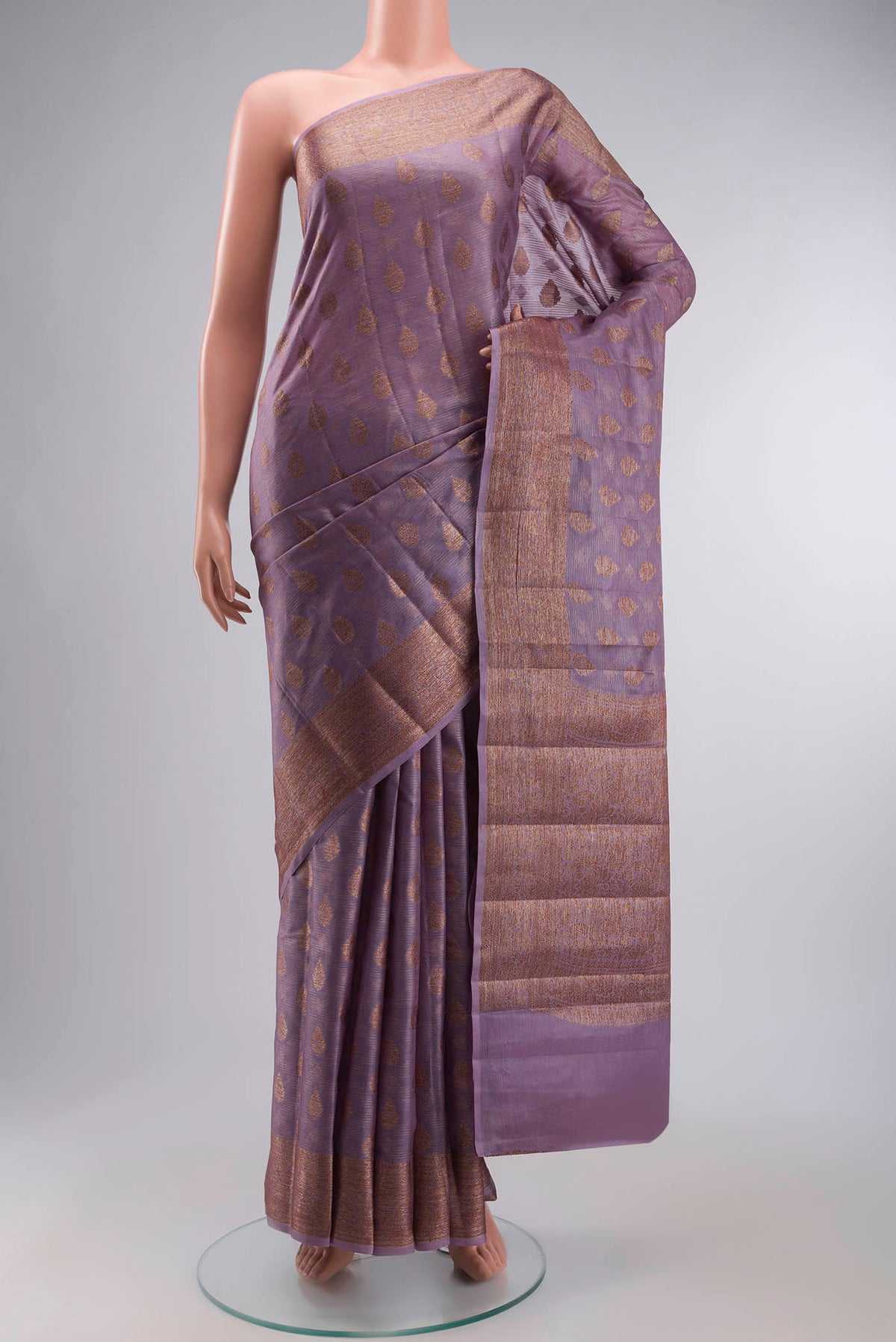 Lavender Banarasi Tussar Silk Saree with Zari Butta on the body and Zari Border displayed on a mannequin