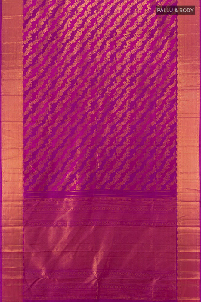 Flat view of Magenta Kanjivaram Silk Saree with Zari Butta on the body and Silk Border. 