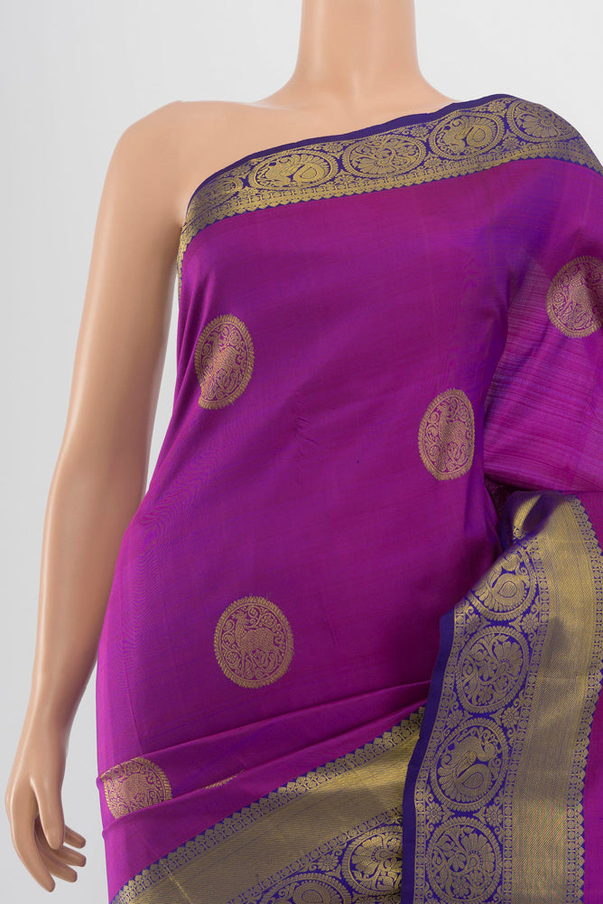 Border image of Pure Silk Pure Zari Purple Kanchipuram Saree with Zari Butta on the body and Silk Border. 