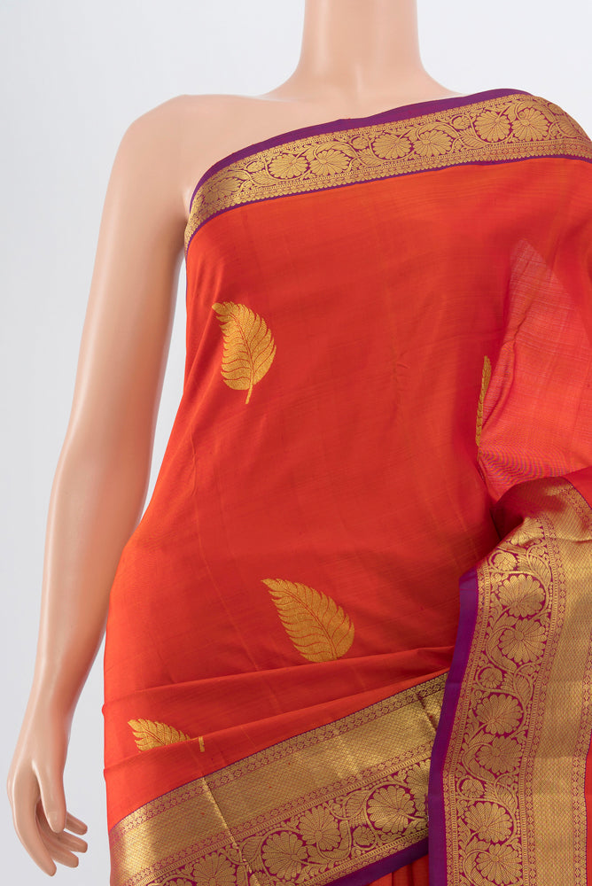 Border image of Brick Orange Kanchipuram Silk Saree with Plain Body and Silk Border. 