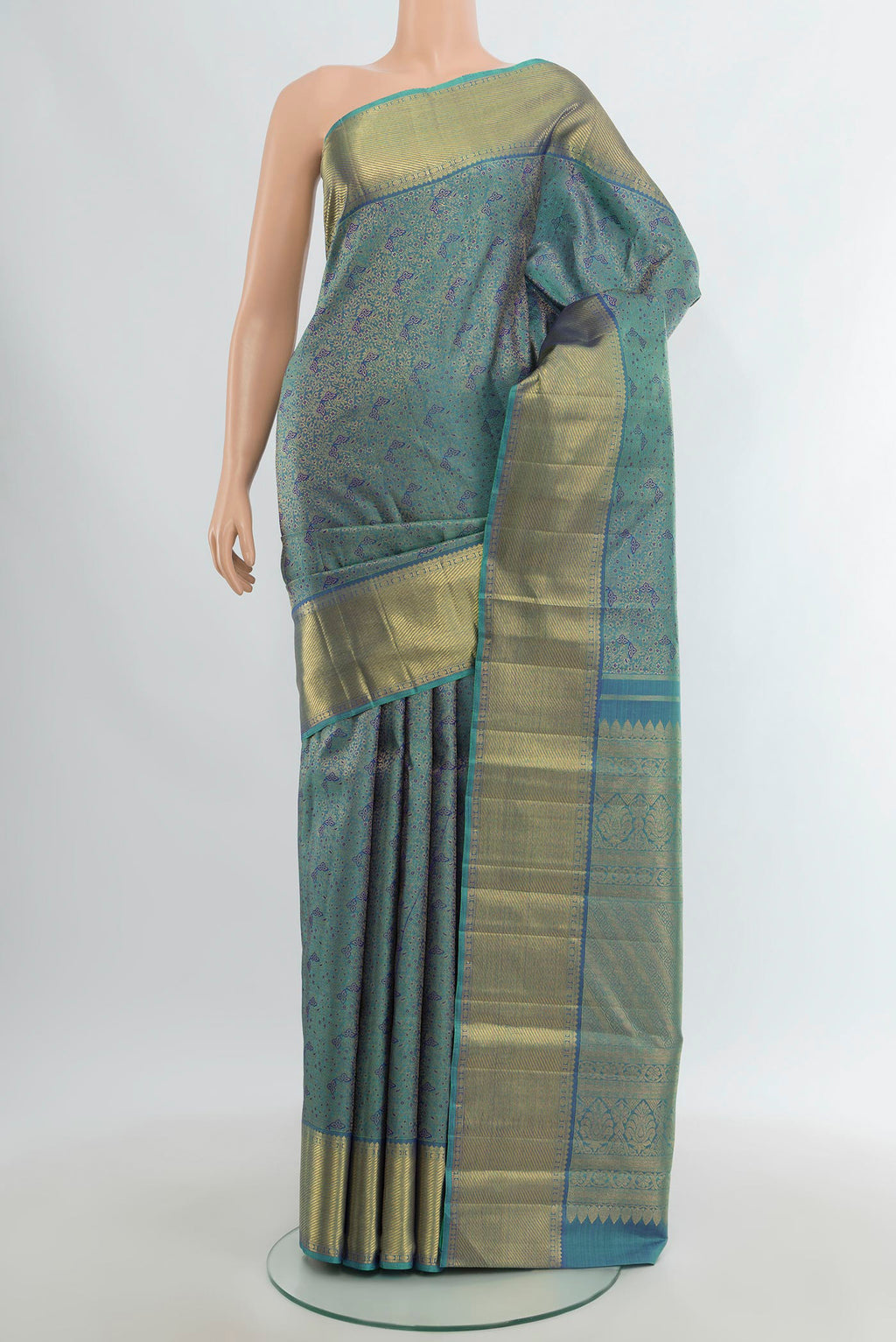 Pure Silk Pure Zari Light Blue Kanjivaram Saree with Zari Brocade on the body and Zari Border.  displayed on a mannequin