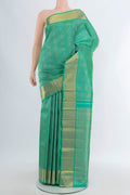Pure Silk Pure Zari Sea Green Kanjivaram Saree with Zari Brocade on the body and Zari Border.  displayed on a mannequin