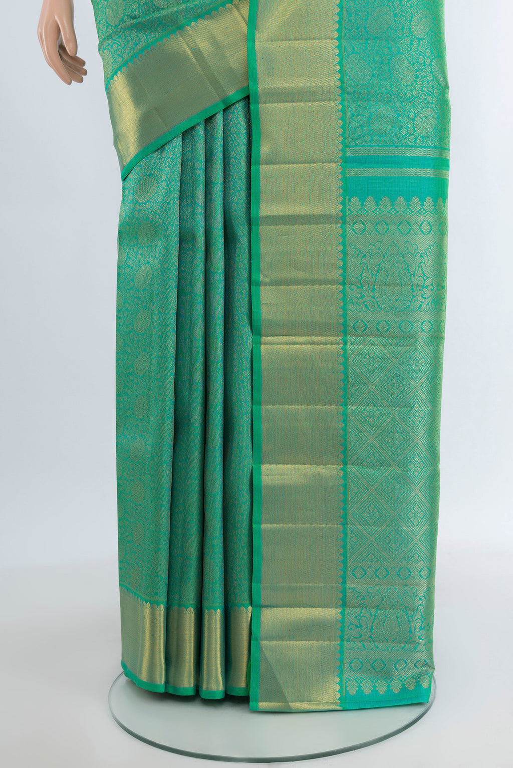 Pleats and pallu of Pure Silk Pure Zari Sea Green Kanjivaram Saree with Zari Brocade on the body and Zari Border. 