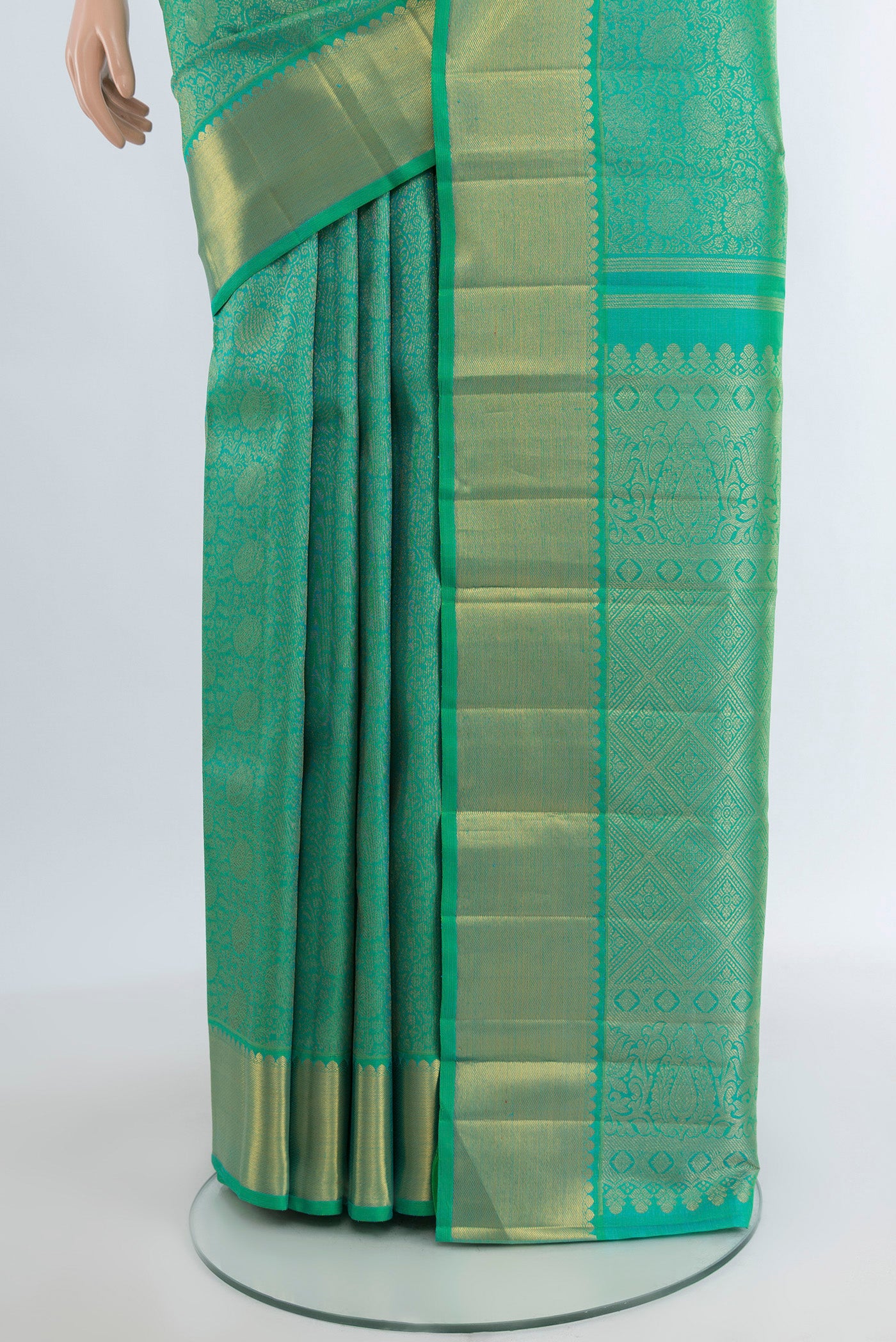 Pleats and pallu of Pure Silk Pure Zari Sea Green Kanjivaram Saree with Zari Brocade on the body and Zari Border. 