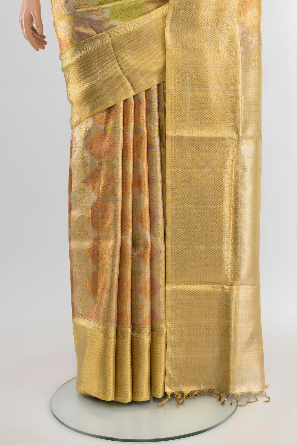 Pleats and pallu of Golden Kanjivaram Tissue Silk Saree with Zari Brocade on the body and Zari Border. 