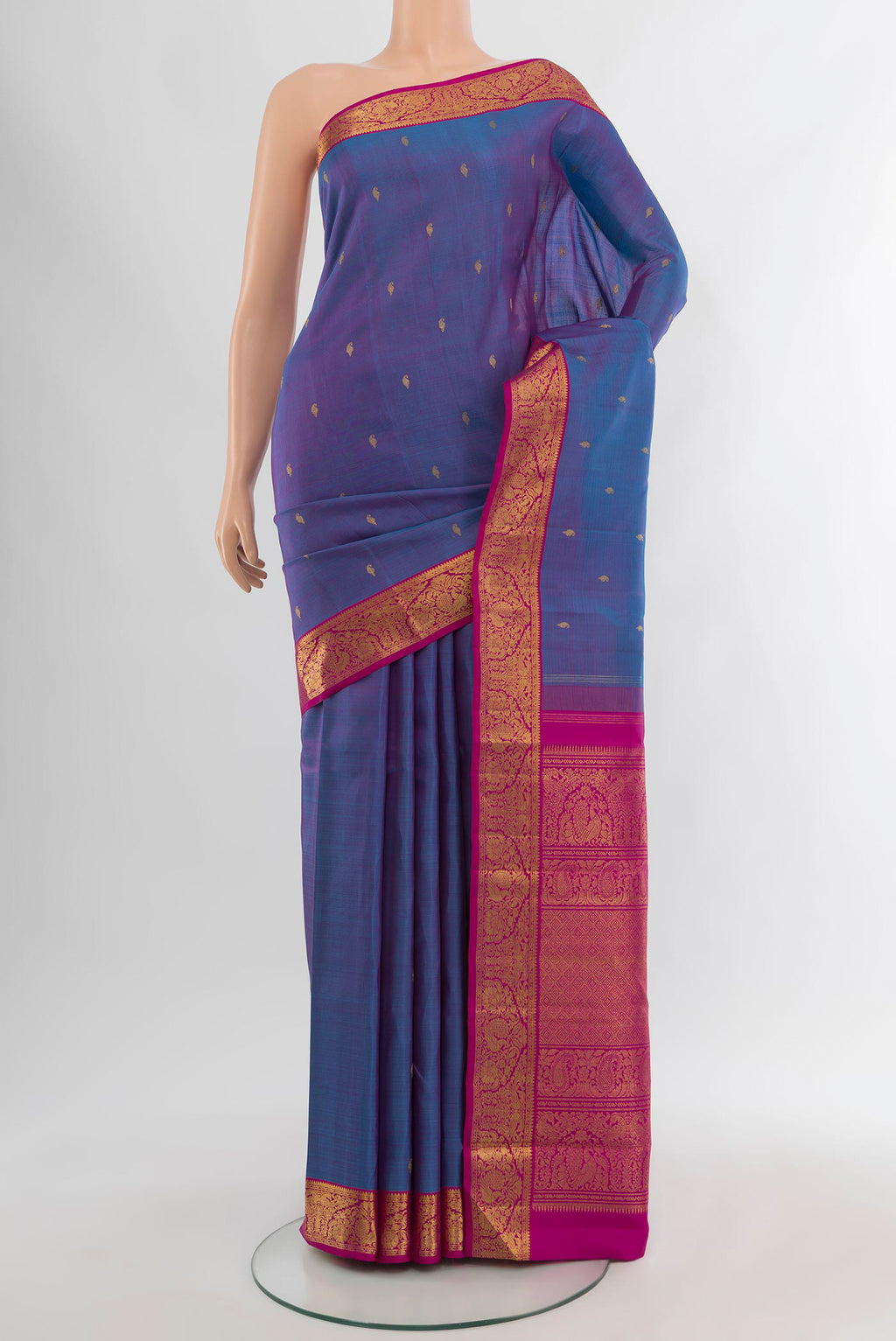 Pure Silk Pure Zari Purple Kanchipuram Saree with Zari Butta on the body and Zari Border.  displayed on a mannequin
