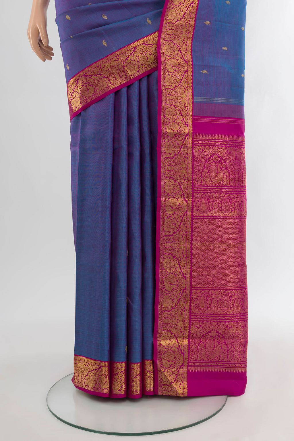 Pleats and pallu of Pure Silk Pure Zari Purple Kanchipuram Saree with Zari Butta on the body and Zari Border. 