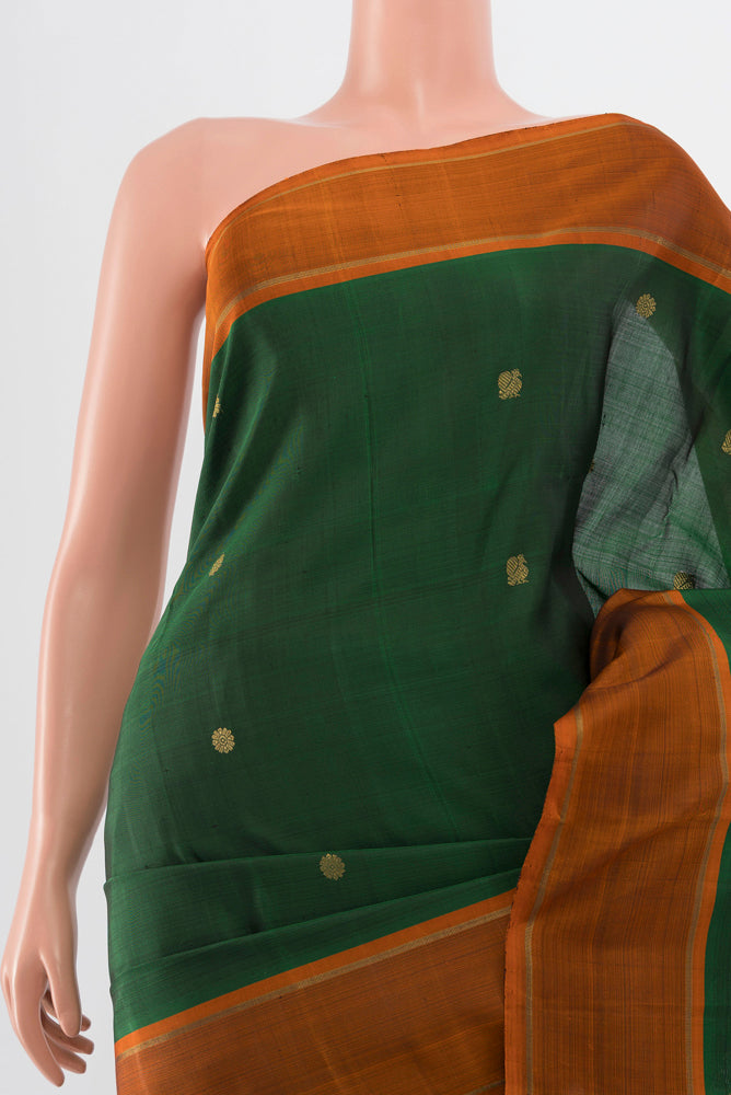 Border image of Pure Silk Pure Zari Mint Green Kanjivaram Saree with Zari Butta on the body and Silk Border. 