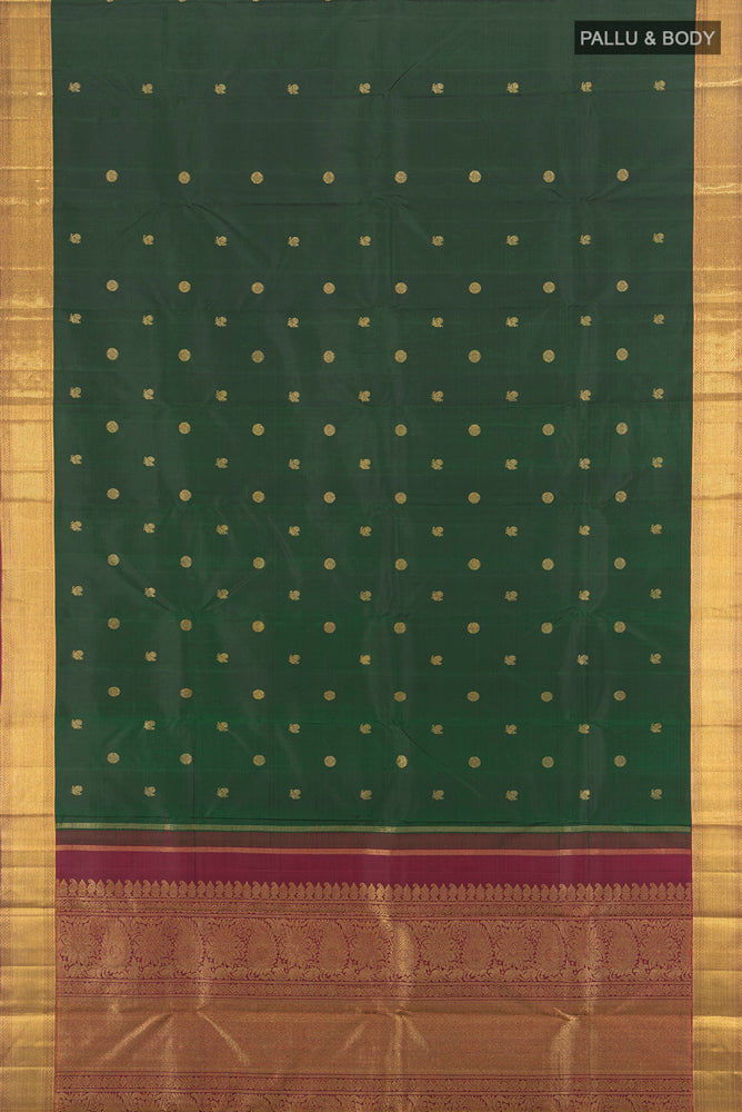 Flat view of Pure Silk Pure Zari Mint Green Kanchipuram Saree with Zari Butta on the body and Silk Border. 