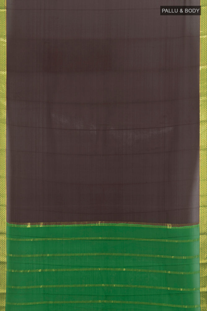 Flat view of Black Mysore Crepe Saree with Zari Butta on the body and Silk Border. 