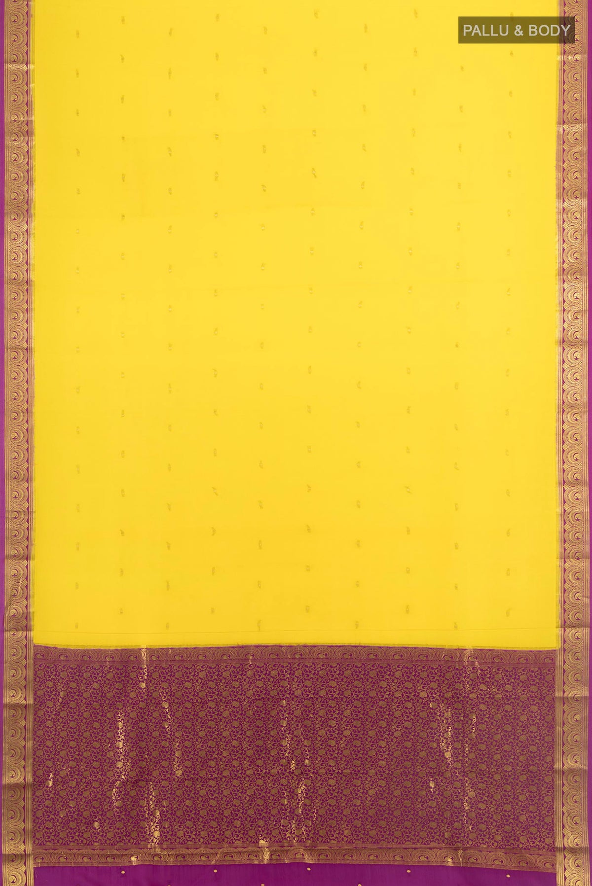 Flat view of Yellow Mysore Crepe Saree with Zari Butta on the body and Zari Border. 
