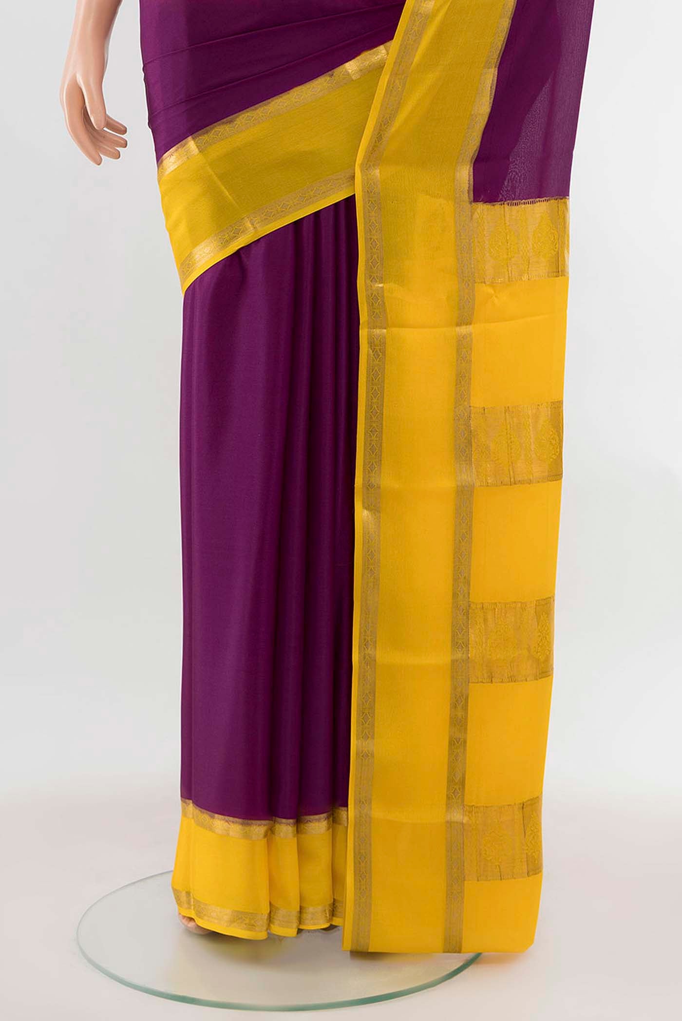 Pleats and pallu of Purple Mysore Crepe Saree with Zari Butta on the body and Silk Border