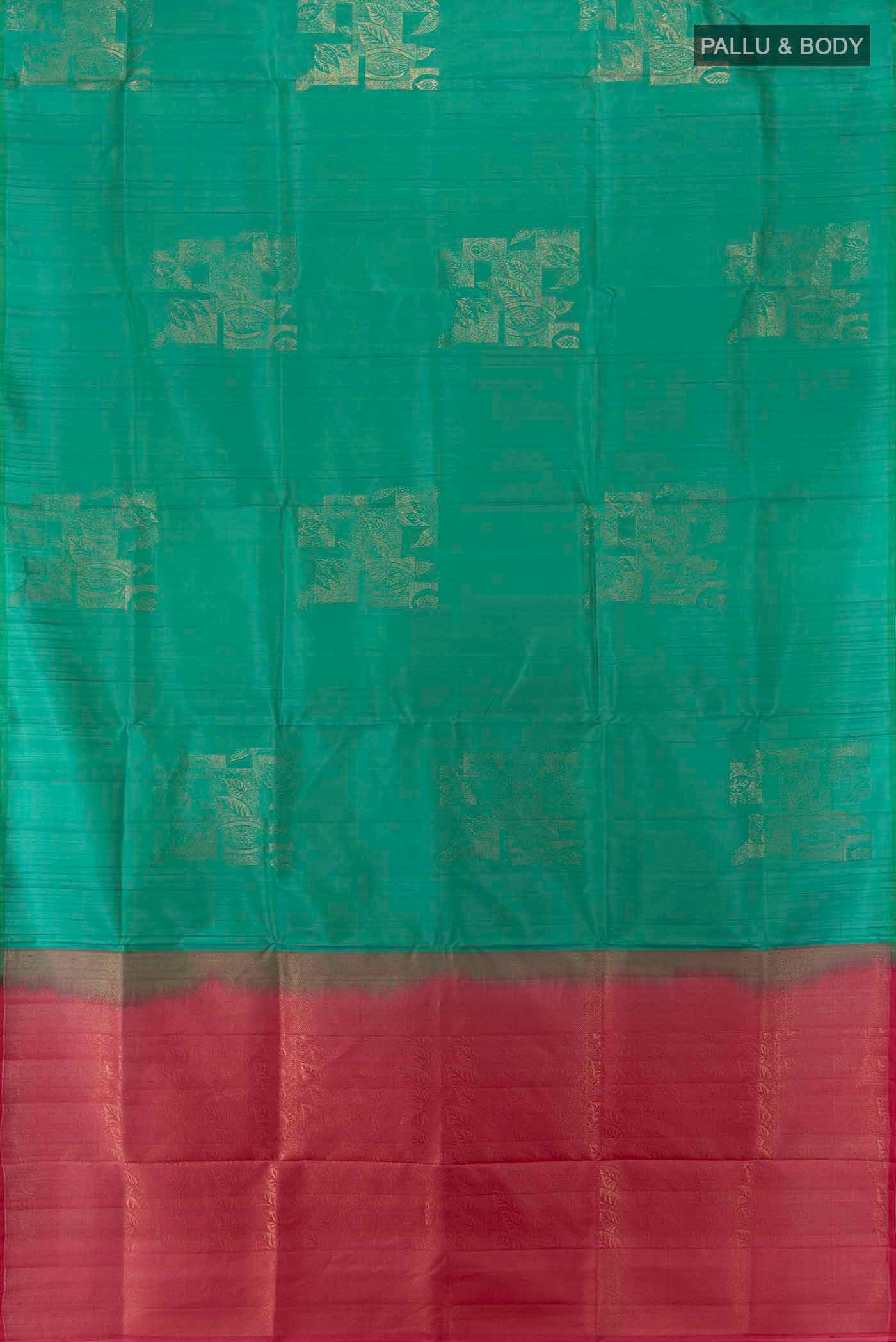 Flat view of Light Green Soft Silk Saree with Zari Butta on the body and Silk Border