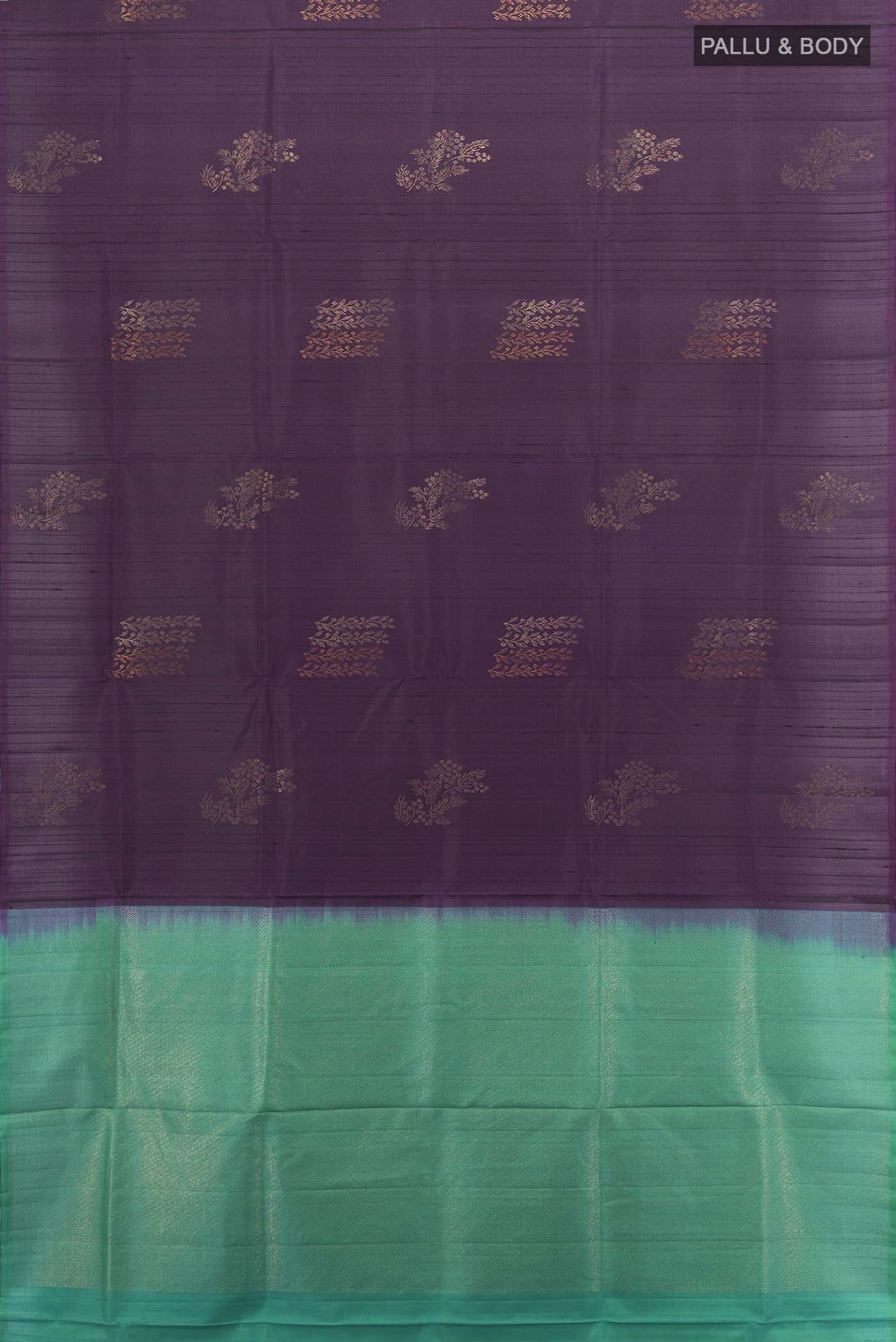 Flat view of Violet Soft Silk Saree with Zari Butta on the body and Silk Border. 