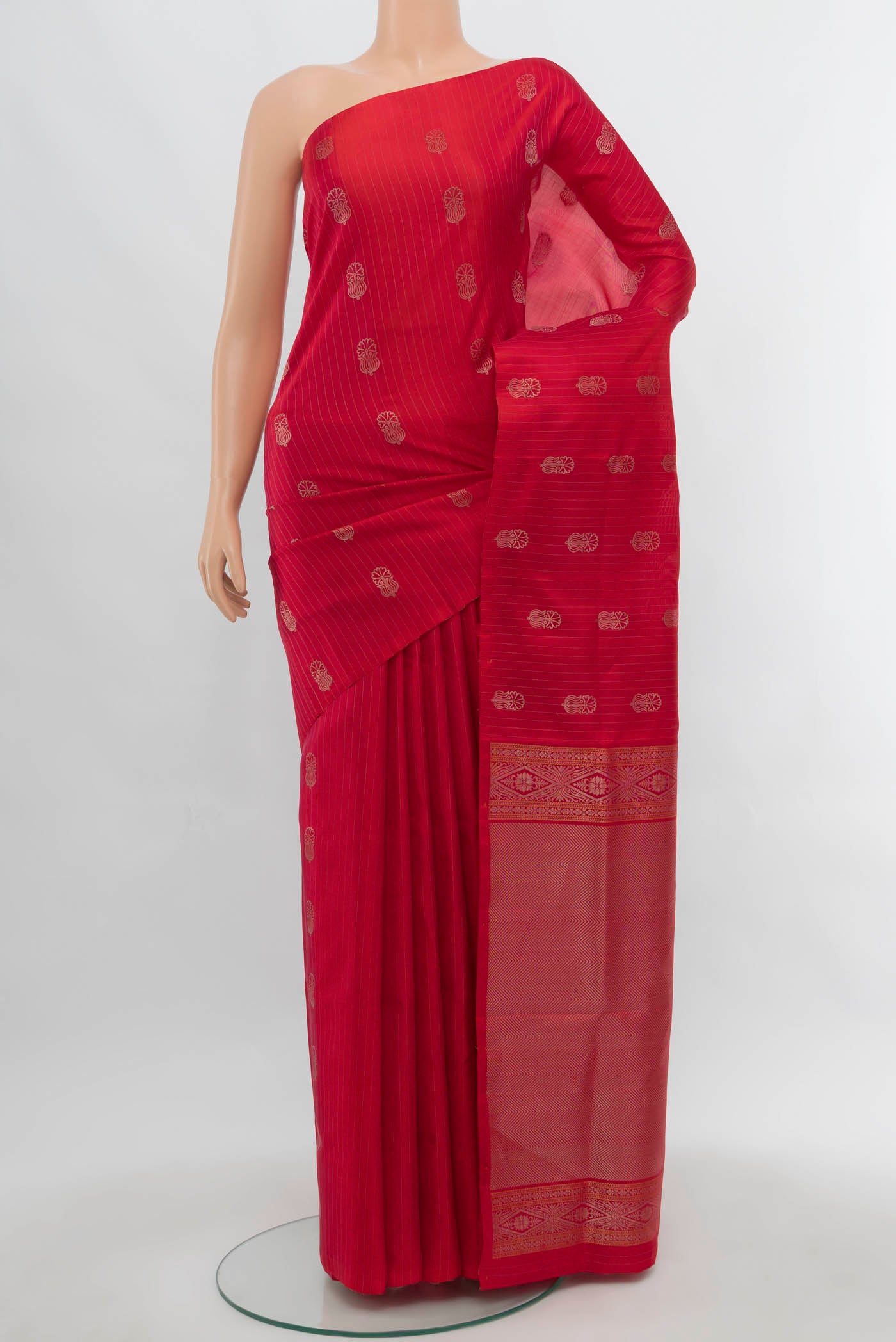 Imperial Red Soft Silk Saree with Zari Butta on the body and Silk Border.  displayed on a mannequin