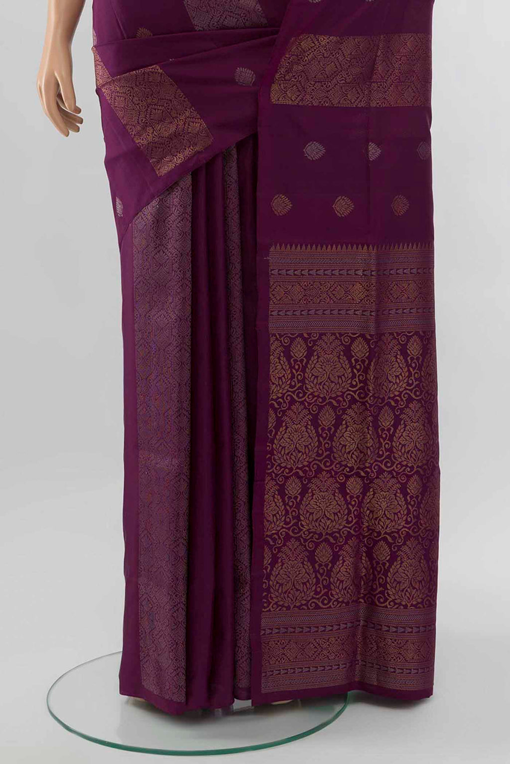 Pleats and pallu of Purple Soft Silk Saree with Zari Brocade on the body and Silk Border