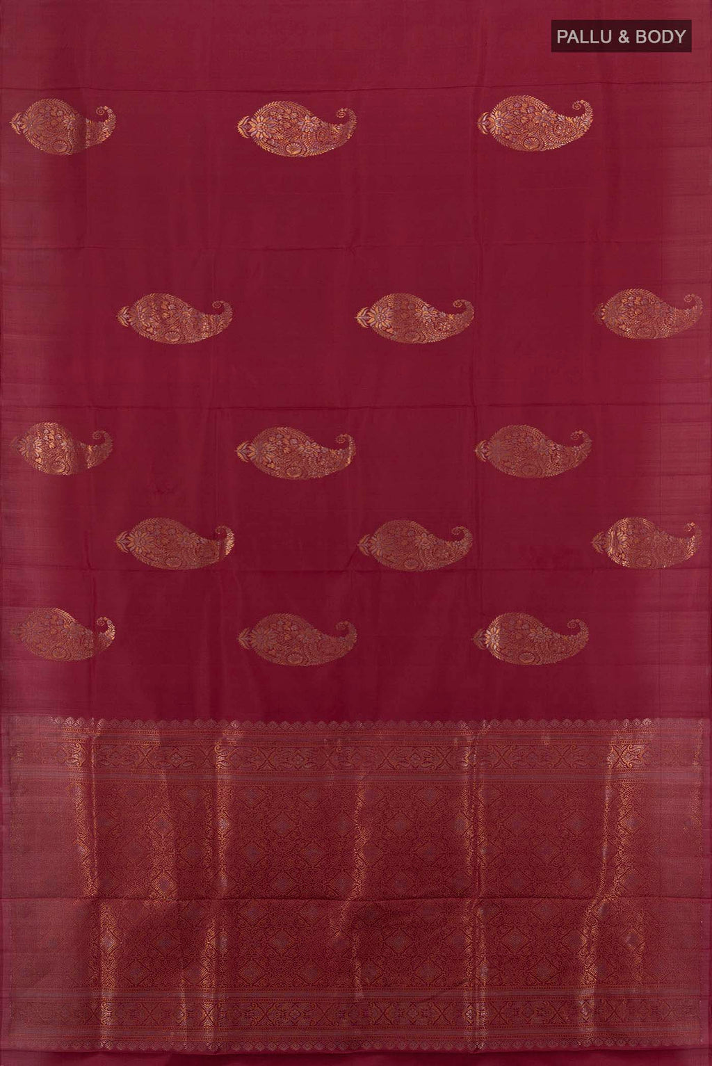 Flat view of Maroon Soft Silk Saree with Zari Butta on the body and Silk Border. 