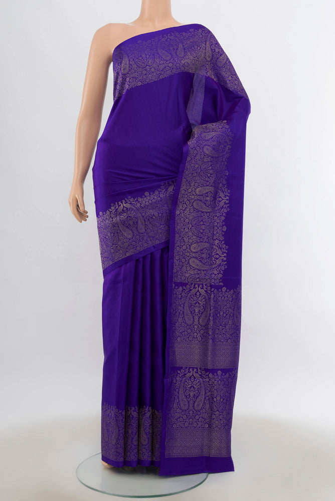 Dark Blue Soft Silk Saree with Zari Butta on the body and Silk Border.  displayed on a mannequin