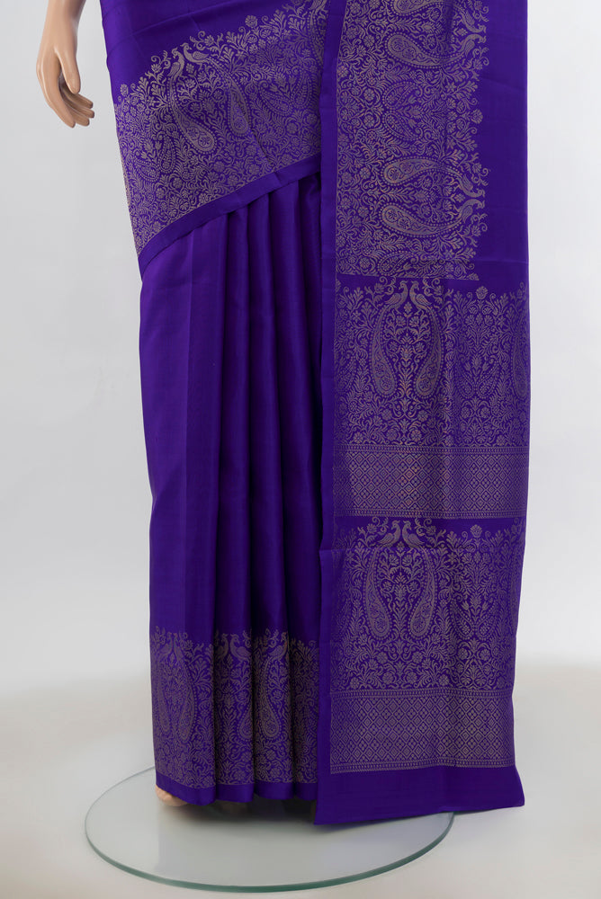 Pleats and pallu of Dark Blue Soft Silk Saree with Zari Butta on the body and Silk Border. 